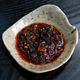 macha crunch (salsa macha) in bowl on tabletop